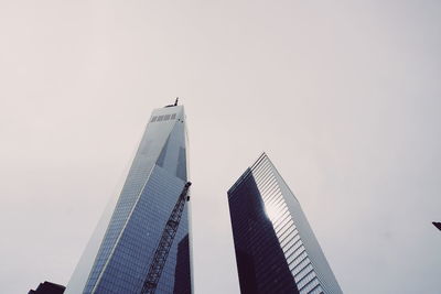 Low angle view of modern buildings against sky