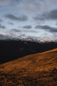 Scenic view of mountains against sky during winter