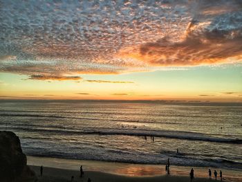 Scenic view of sea at sunset