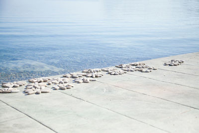 High angle view of text on beach against sky