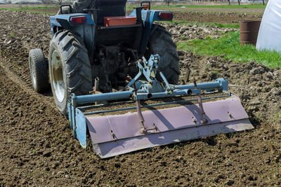 Abandoned vehicle on field