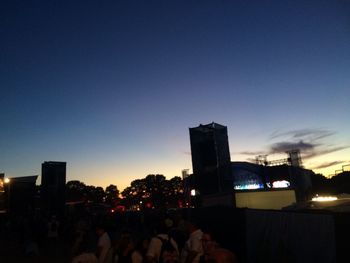 View of illuminated cityscape at dusk