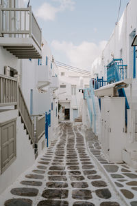 View of alley amidst houses