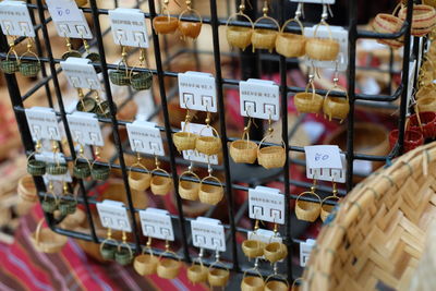 Close-up of earrings for sale in store