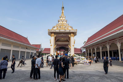 Group of people in front of building