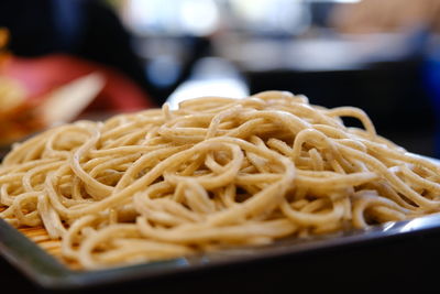 Close-up of noodles served in plate on table