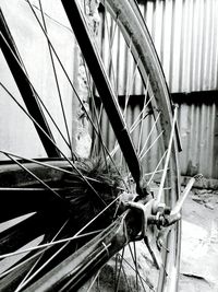 Close-up of bicycle wheel against sky