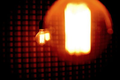 Close-up of illuminated light bulb