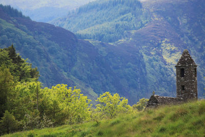 Panoramic view of trees and buildings against sky