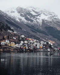 City by mountain against sky