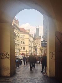 People walking on street in city