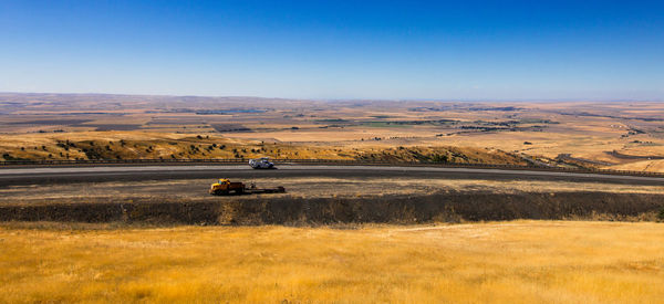 Scenic view of land against sky