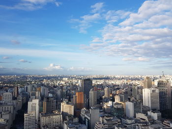 High angle view of buildings against sky in city