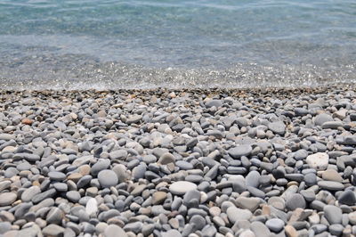 High angle view of pebbles on beach