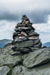 Stack of rocks against sky