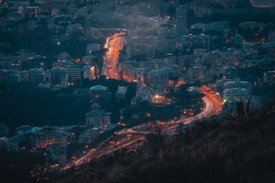 High angle view of illuminated buildings at night