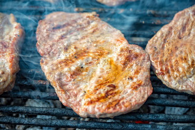 Close-up of meat on barbecue grill