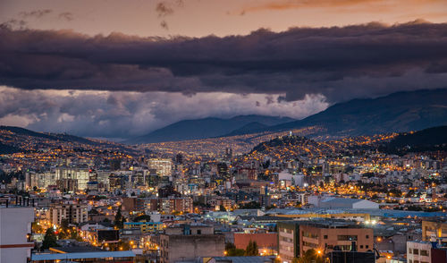 High angle view of illuminated buildings in city