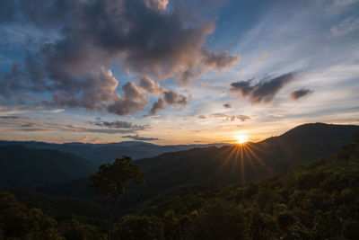 Scenic view of landscape against sky during sunset