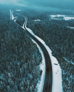 High angle view of road on snow covered landscape