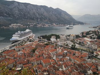 High angle view of townscape by sea