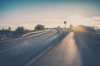 View of country road against sky