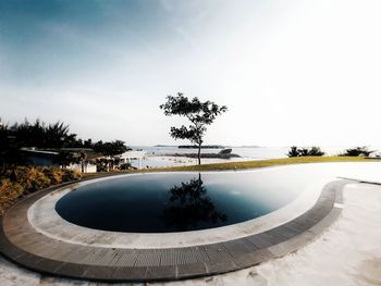 Infinity pool against sky