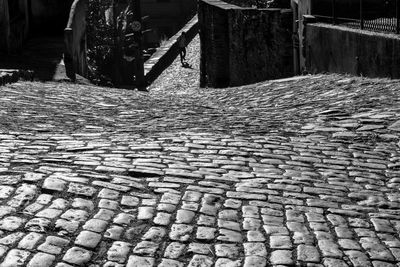 Cobblestone street in old building