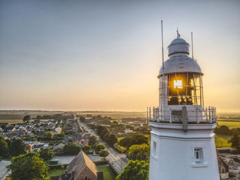 High angle view of buildings against sky during sunset