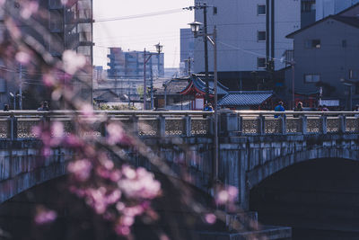 Blurred motion of buildings and bridge in city