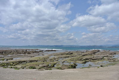 Scenic view of beach against sky