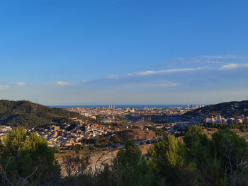 High angle shot of townscape against sky