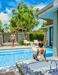 Woman swimming in pool