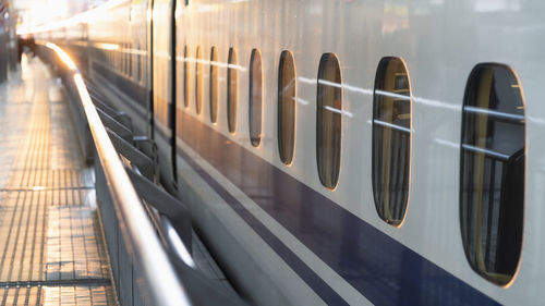 Japanese bullet train at sunset