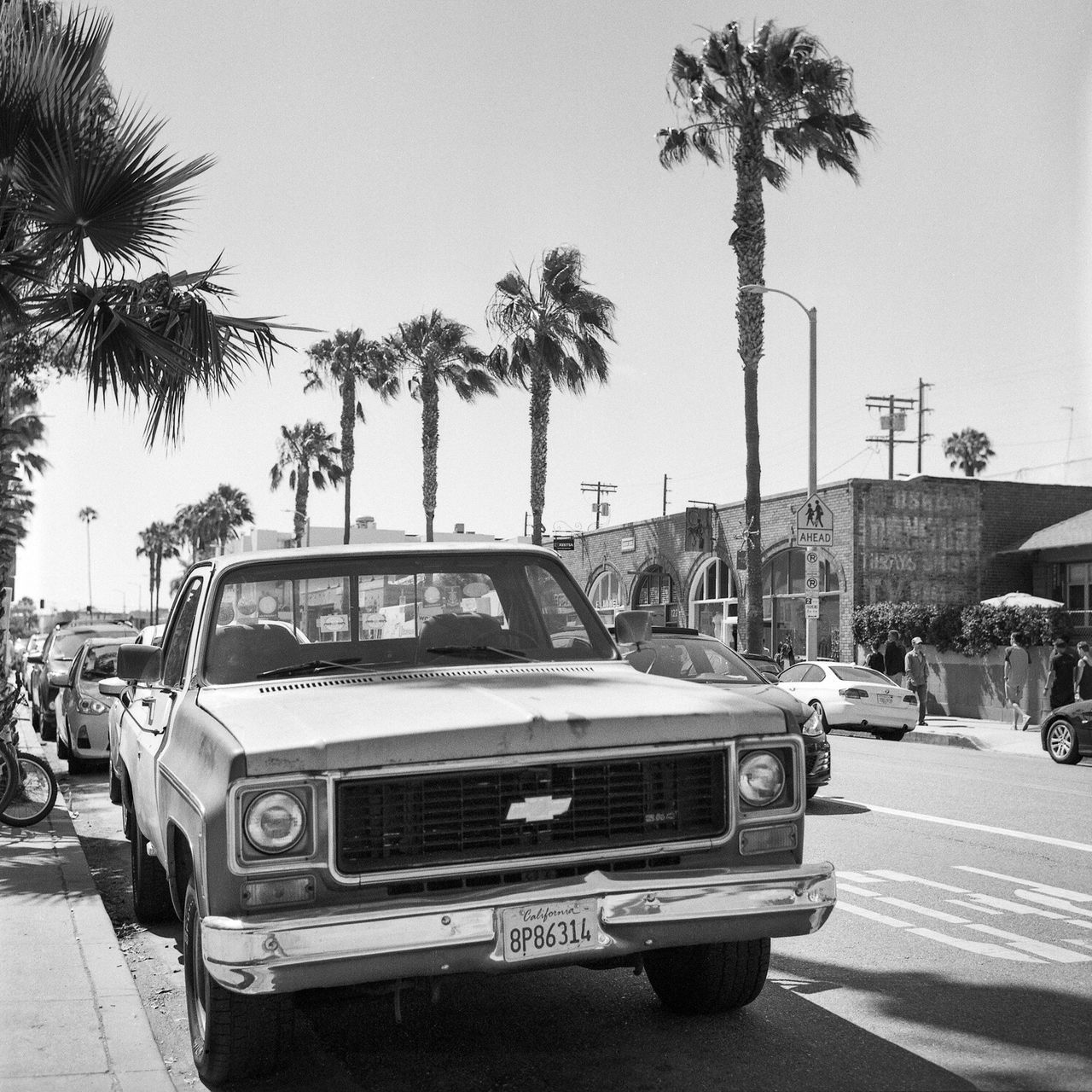 CARS ON STREET IN CITY