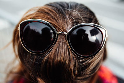 Close-up of woman wearing sunglasses