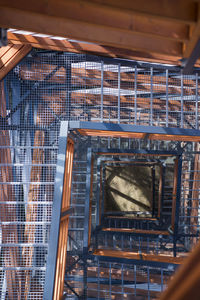 Low angle view of spiral staircase in building