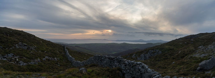 Scenic view of landscape against sky during sunset