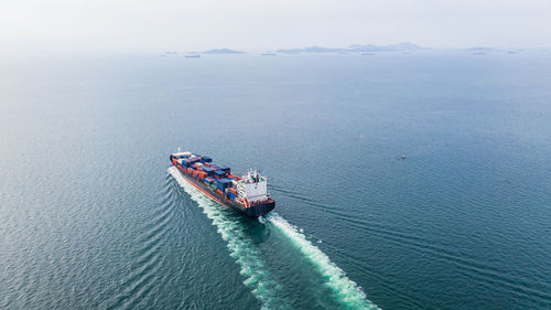 High angle view of ship sailing on sea