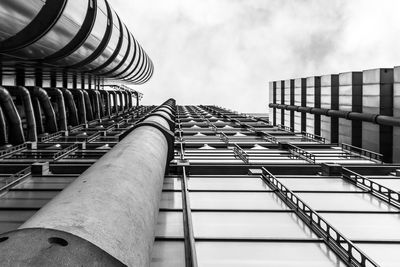 Low angle view of building against cloudy sky