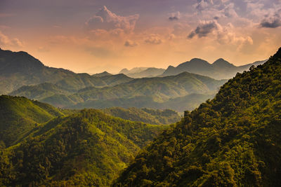 Scenic view of mountains against sky during sunset