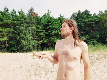 Young man looking at camera