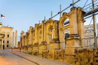 Low angle view of buildings against clear sky