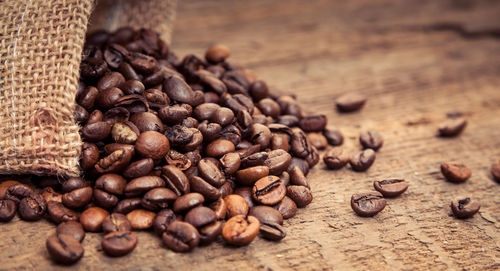 Directly above shot of roasted coffee beans on table