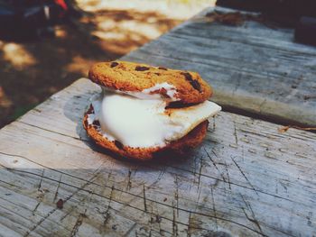 Close-up of ice cream sandwich on table at camping