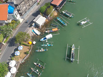 High angle view of boats moored in bay