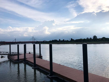 Pier over sea against sky