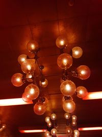 Low angle view of illuminated chandelier