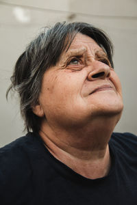 Portrait of mature woman looking away