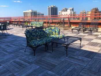 Empty chairs and tables in building